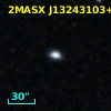 2MASX J13243103+1328452