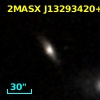 2MASX J13293420+1138105