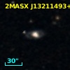 2MASX J13211493+0030274