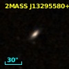 2MASS J13295580+0007079