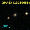 2MASX J13280658+0004094