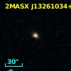 2MASX J13261034+0005077