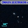2MASX J13295638+0047264