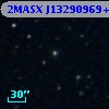 2MASX J13290969+0018424