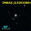 2MASX J13263380+0009247