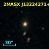 2MASX J13224271+0009336