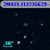 2MASX J13235629-0007055