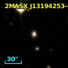 2MASX J13194253-0129387