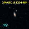 2MASX J13203984-0005457