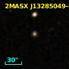 2MASX J13285049-0003551