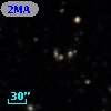 2MASX J13221833-0338232