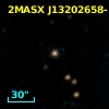 2MASX J13202658-1233275