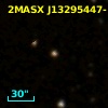 2MASX J13295447-1242061
