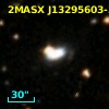 2MASX J13295603-3208311