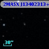 2MASX J13402313+2440085