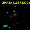 2MASX J13373372+2120027
