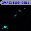 2MASX J13340651+2038575