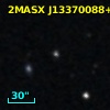 2MASX J13370088+1810291