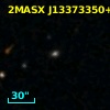 2MASX J13373350+2026047