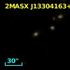 2MASX J13304163+1123403