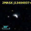 2MASX J13404937+0616586