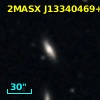 2MASX J13340469+0320492