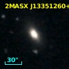2MASX J13351260+0339116