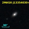 2MASX J13354030+0317356