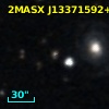 2MASX J13371592+0309369