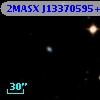 2MASX J13370595+0154309