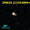 2MASX J13343889+0009147