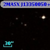 2MASX J13350050+0003376