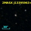 2MASX J13395963+0003584