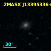 2MASX J13395336+0002539