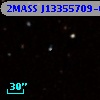 2MASS J13355709-0008358