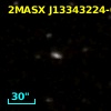 2MASX J13343224-0325588