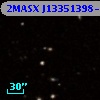 2MASX J13351398-0329141