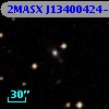 2MASX J13400424-0549360