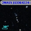 2MASX J13364224-2422489