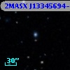 2MASX J13345694-2700586