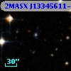 2MASX J13345611-3122457
