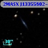 2MASX J13355802-3119098