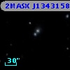 2MASX J13431580+2609530