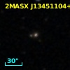 2MASX J13451104+2058285