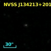 2MASX J13421357+2012077