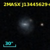 2MASX J13445629+2016376