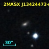 2MASX J13424473+0805318