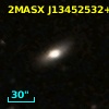 2MASX J13452532+0348237