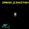 2MASX J13443740+0033414