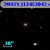 2MASX J13453042+0020367